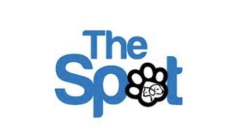 A blue and white logo of the spot
